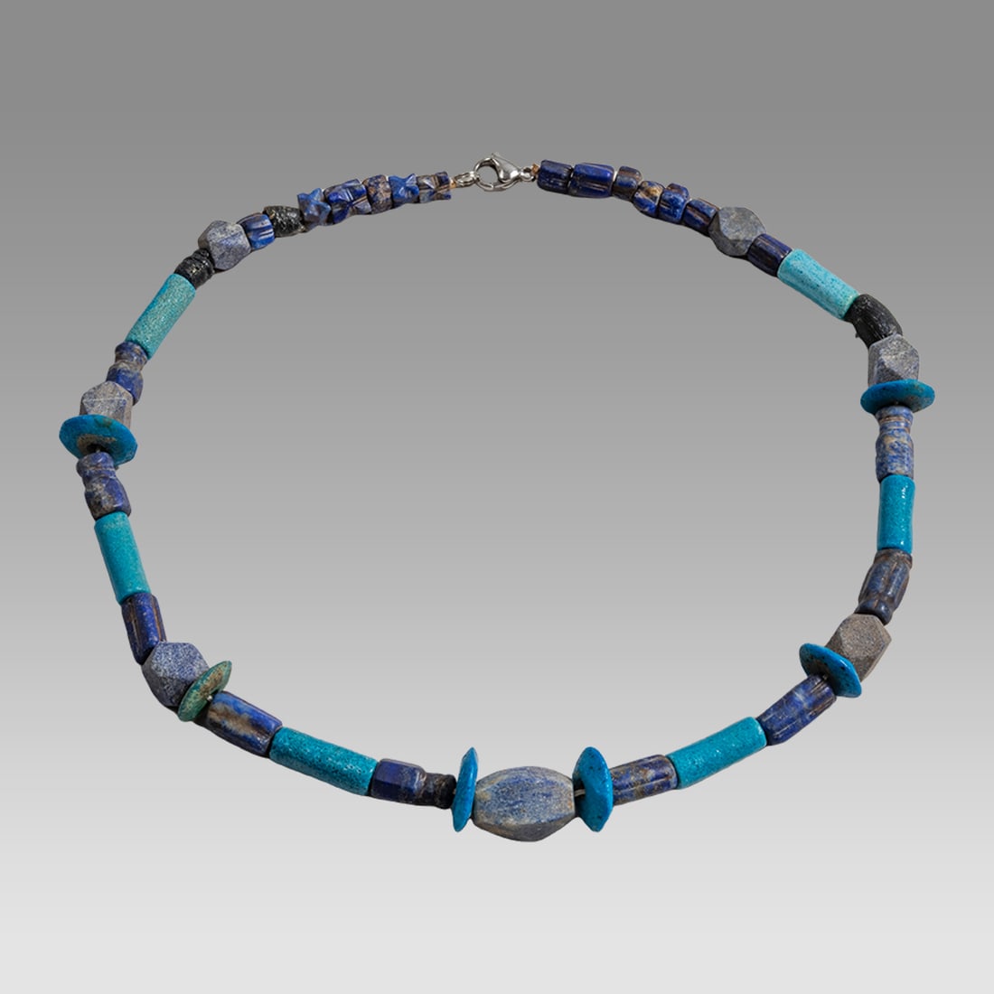 Ancient Egyptian Faience, Necklace c.300-50 BC.: Ancient Egyptian Faience, Necklace c.300-50 BC. Size 17 1/2 inches length. Great Looking single strand Faience Bead necklace mixed lapis lazuli beads. wearable. Provenance: Ex Secret Eyes Gallery New
