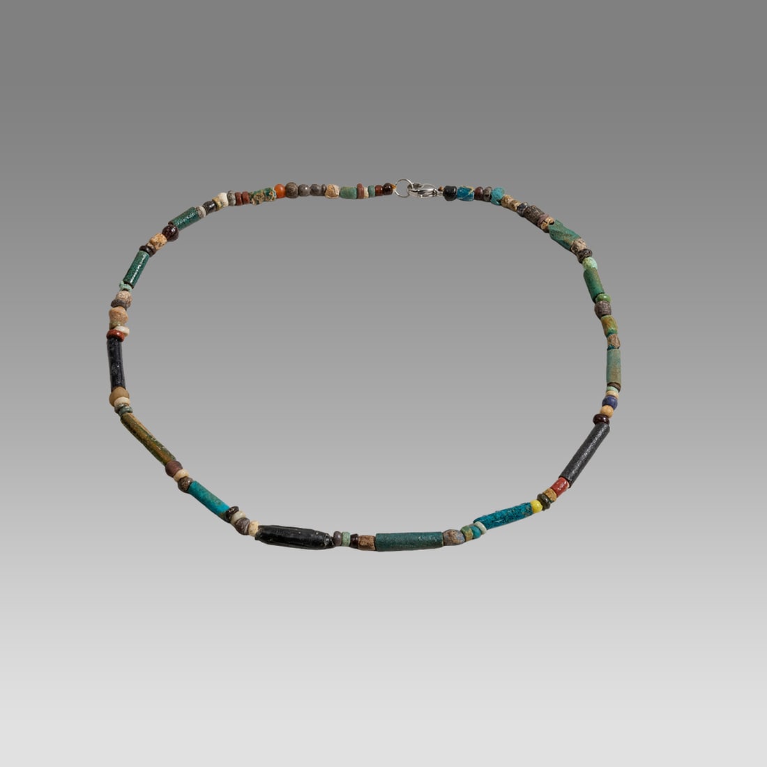 Ancient Egyptian Faience, Necklace c.300-50 BC.: Ancient Egyptian Faience, Necklace c.300-50 BC. Size 17 5/8 inches length. Great Looking single strand Faience Bead necklace with Roman glass beads. wearable. Provenance: Ex Secret Eyes Gallery New Yo