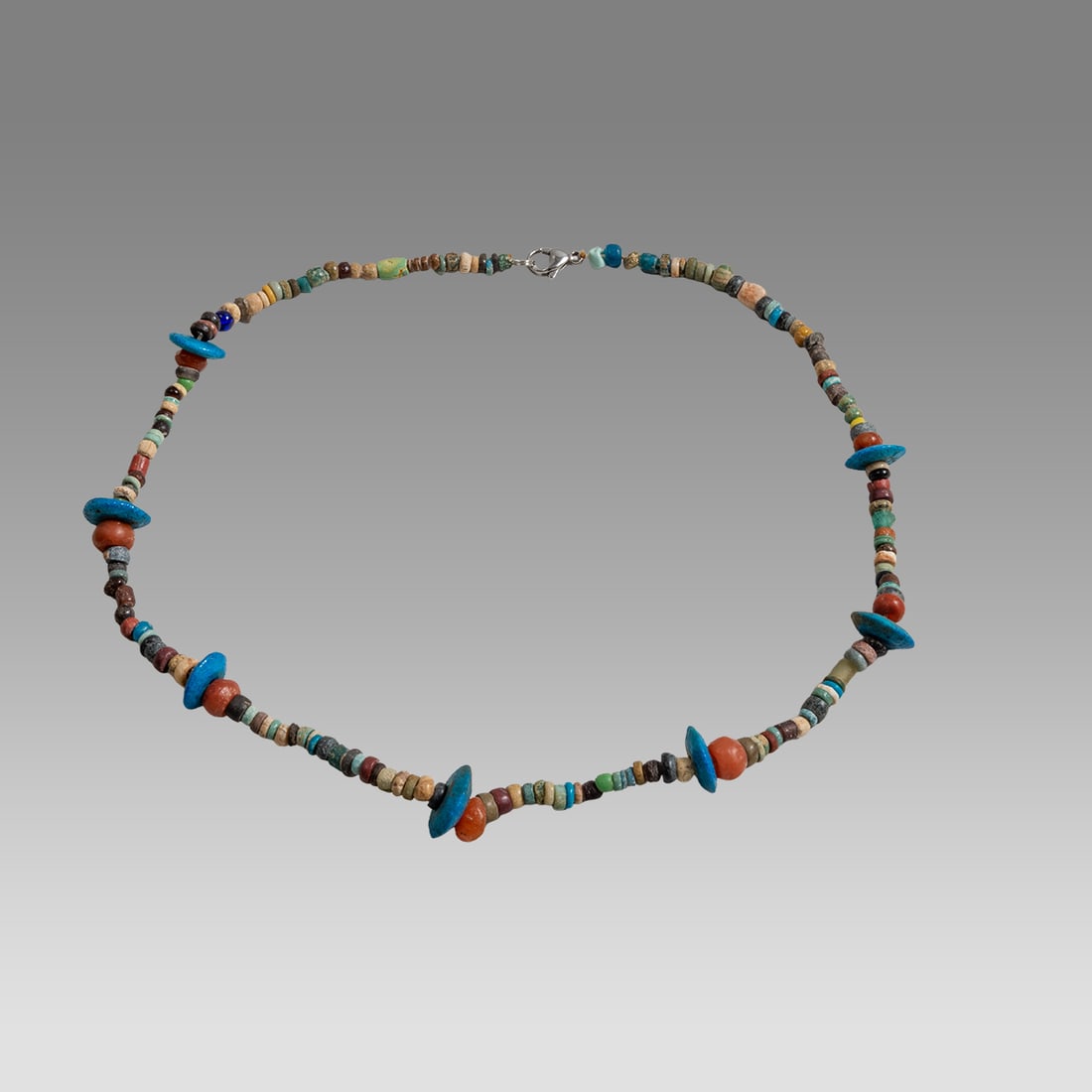 Ancient Egyptian Faience, Necklace c.300-50 BC.: Ancient Egyptian Faience, Necklace c.300-50 BC. Size 18 3/4 inches length. Great Looking single strand Faience Bead necklace with Roman glass beads. wearable. Provenance: Ex Secret Eyes Gallery New Yo