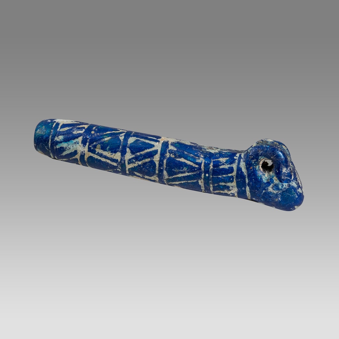 Mesopotamian Style Blue Glass Ram Finial.: Mesopotamian Style Blue Glass Ram Finial. Size 5 3/4 inches length. Cast blue color glass Ram finial. Not ancient. Provenance: Private collection; bought in Vienna, Austria in the 1990s.