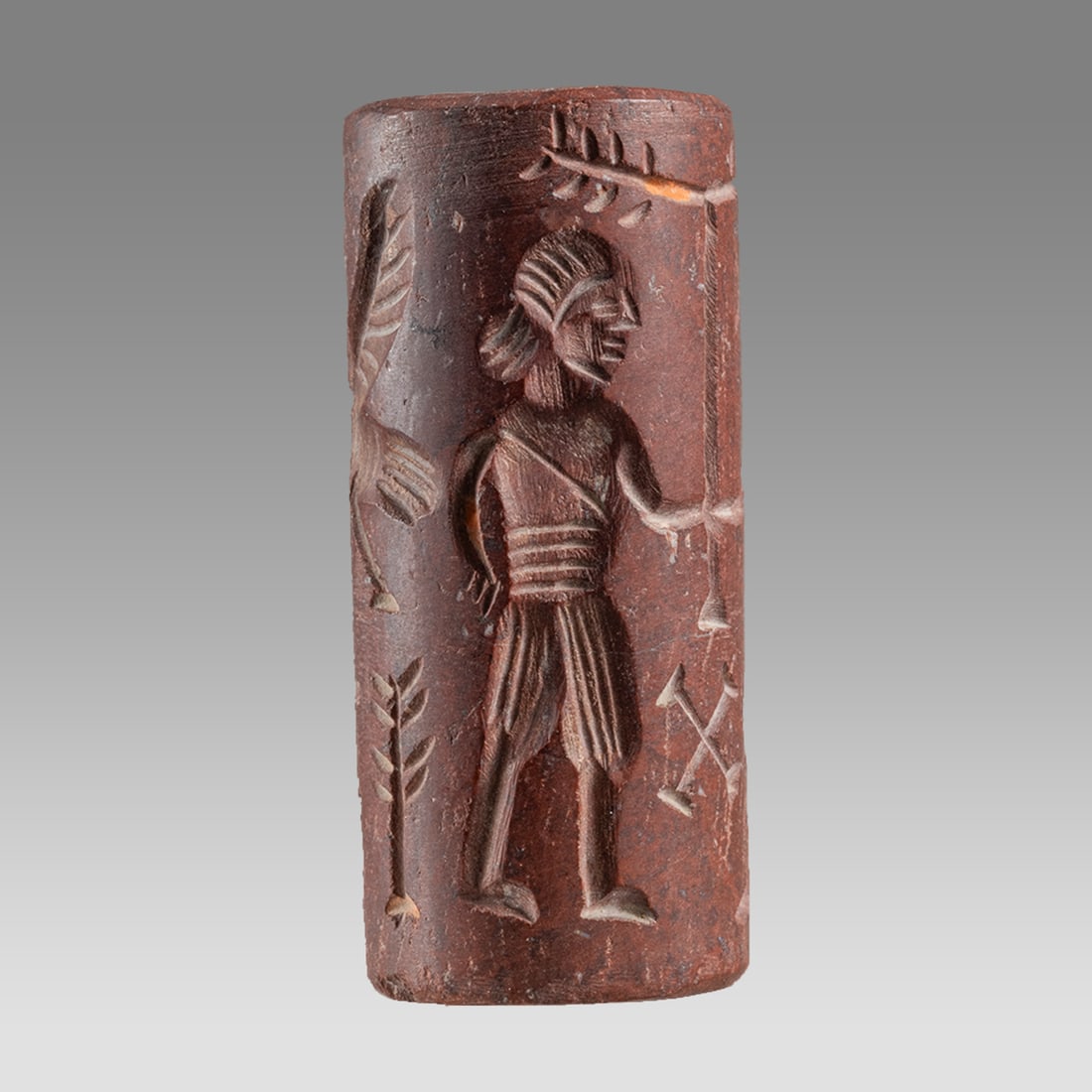 Mesopotamian Style Stone Cylinder Seal.: Mesopotamian Style Stone Cylinder Seal. Size 42 x 19 mm. Carved stone large cylinder seal with presentation scene. suspension hole. Not ancient. Provenance: Private London collection; previously acqui