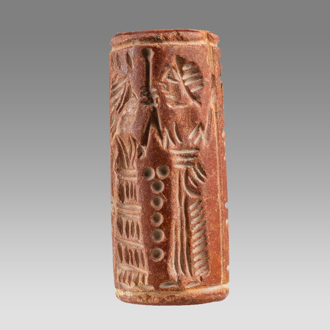 Mesopotamian Style Stone Cylinder Seal.: Mesopotamian Style Stone Cylinder Seal. Size 40 x 17 mm. Carved stone large cylinder seal with presentation scene, inscription. suspension hole. Not ancient. Provenance: Private London collection; pre