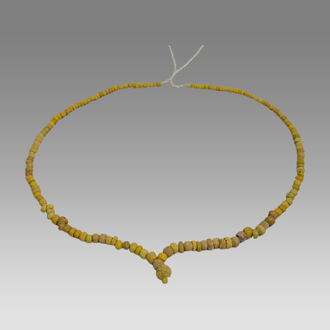 Roman Yellow Glass Bead Necklace.: Roman Yellow Glass Bead Necklace. Size 18 inches length. Fine Yellow Glass beads in a strand. Ex Silk Road NYC.