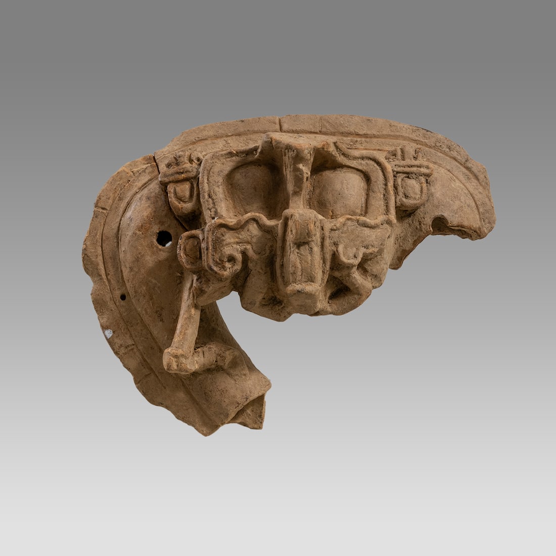 Maya? Terracotta Urn Fragment with Face.: Maya? Terracotta Urn Fragment with Face. Size 8 inches length, 5 inches high, 3 inches depth. Hollow terracotta fragment from Urn with face. Most likely Maya culture. Provenance: Private Florida colle