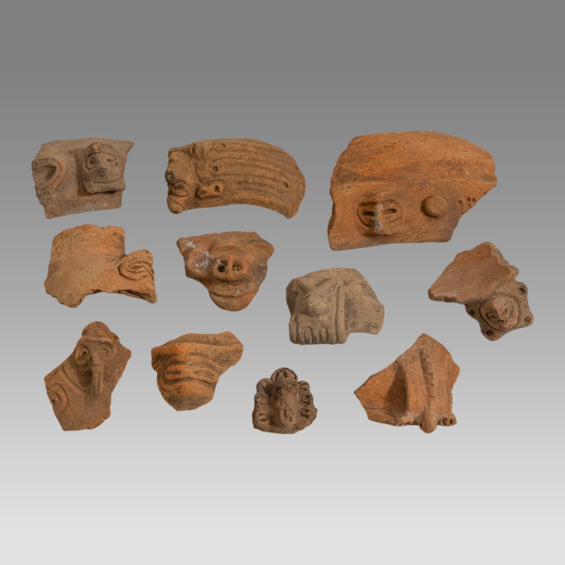 Lot of 10 Pre Columbian Taino Terracotta Heads Fragments. (1 of 2)
