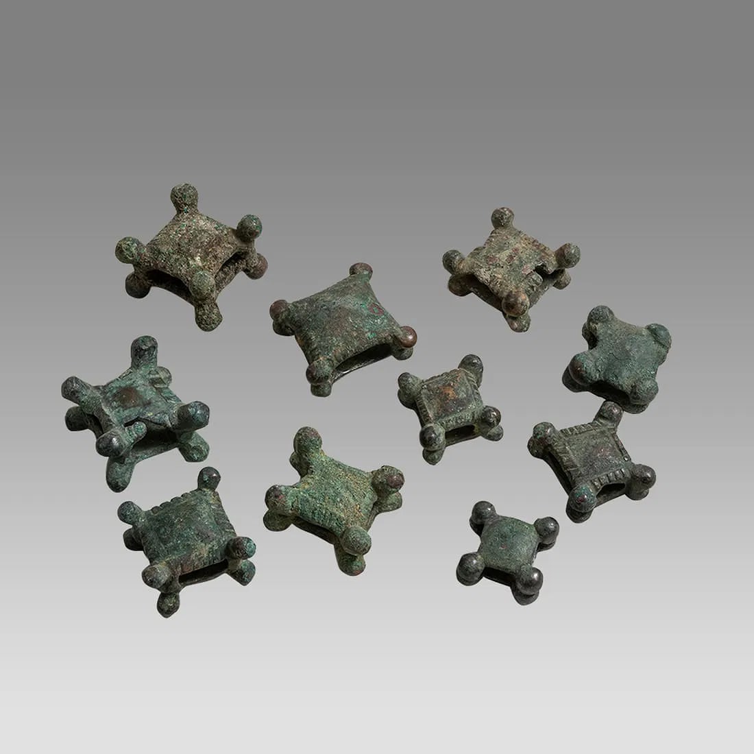 Lot Of 10 Ancient Luristan Bronze, Belt Ornaments c.800 BC.: Lot Of 10 Ancient Luristan Bronze, Belt Ornaments c.800 BC. Size 0 3/4 - 1 inch length. A collection of 10 cast bronze belt strap ornments. Provenance: From a Private NJ collection acquired 50 years a
