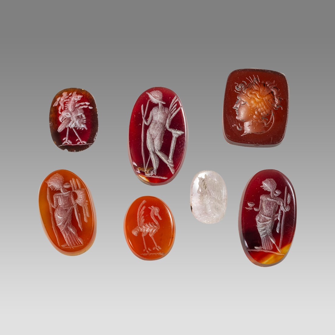 Lot of 7 Roman Style Carnelian Intaglio ring stones. (1 of 1)