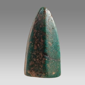 Ancient glass bullet style gaming piece, Roman 1st-4th C CE,