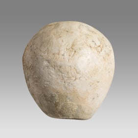 Pre-Dynastic Indurated hardened Macehead with a piriform body and wide central aperture, Limestone,