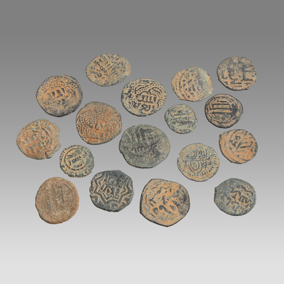 Lot 0f 17 Islamic Bronze coins Abbasid and Ayyubid Dynasty c.8th-13th century AD.: Lot 0f 17 Islamic Bronze coins Abbasid and Ayyubid Dynasty c.8th-13th century AD. Size 16-23 mm.