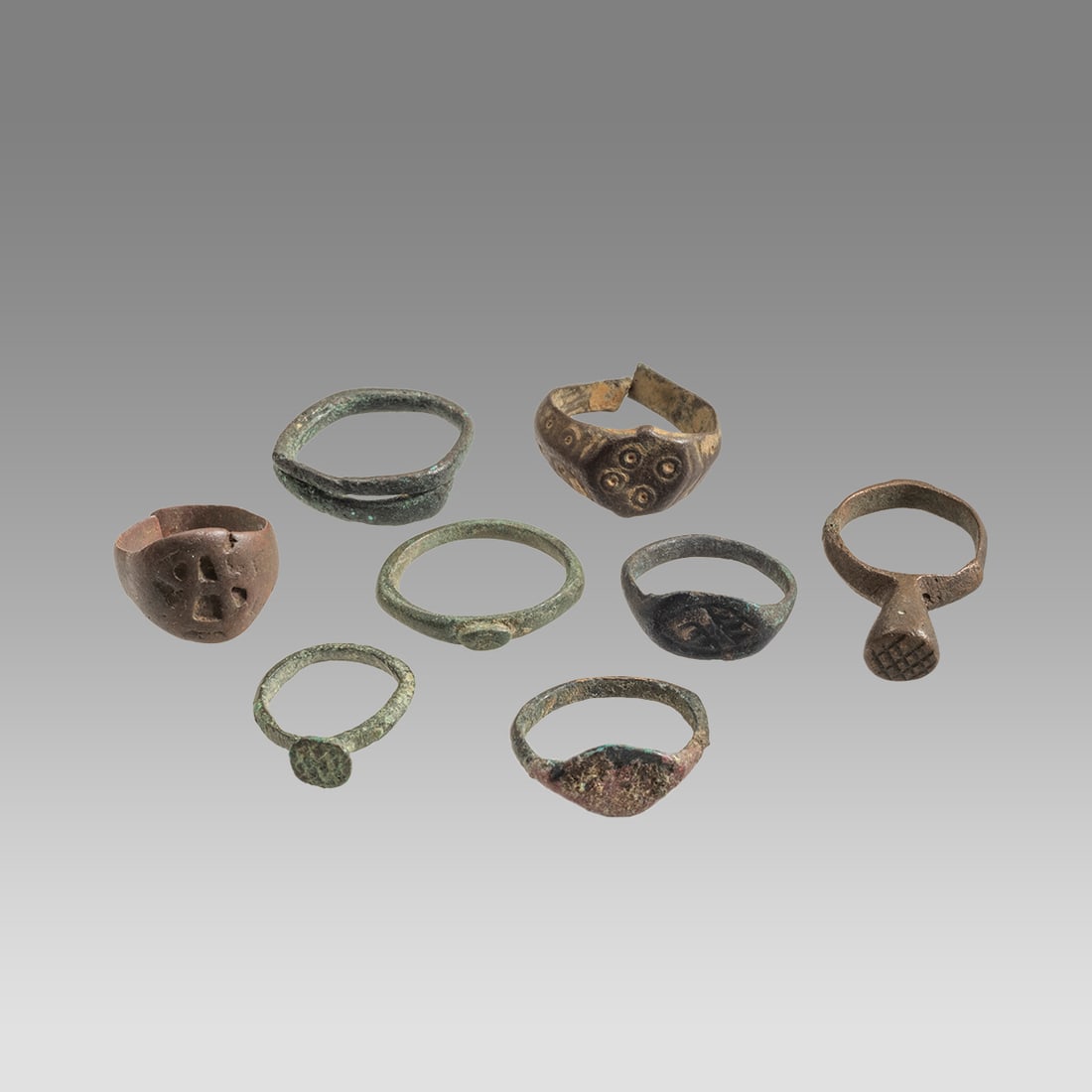 Lot of 8 Roman Bronze Rings c.2nd-4th century AD.: Lot of 8 Roman Bronze Rings c.2nd-4th century AD. Size 17-23 mm. Ring size 2-8. Fine cast bronze rings. Provenance: Ex Florida collection acquired in the USA Market.