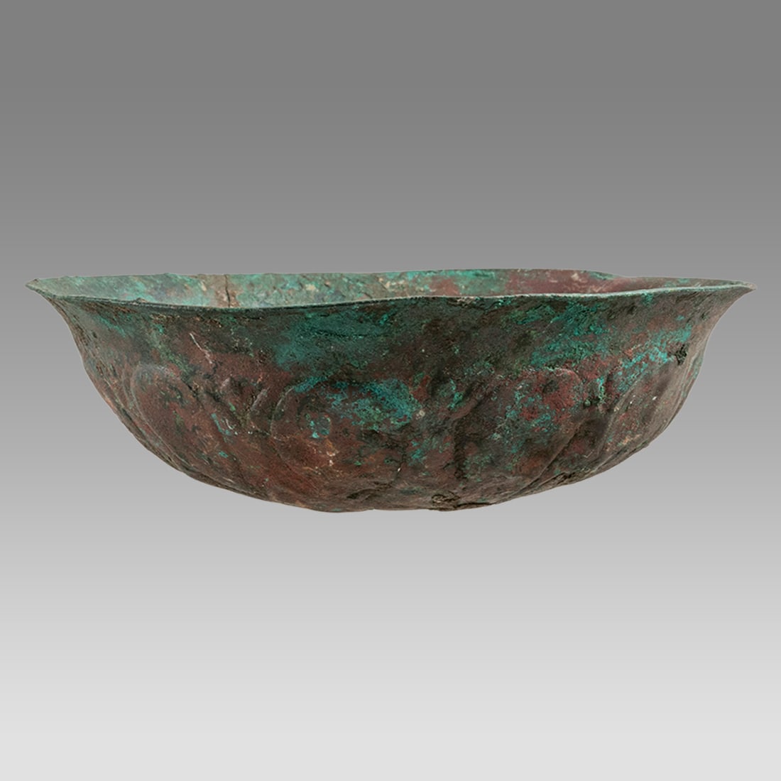Ancient Luristan Bronze Phiale Bowl Ca.8th century B.C.: Ancient Luristan Bronze Phiale Bowl Ca.8th century B.C. Size 6 3/4 inches diameter. 2 inches high. Fine cast bronze Phiale bowl decorated with Almond shape design. Provenance: Private Florida Collecti