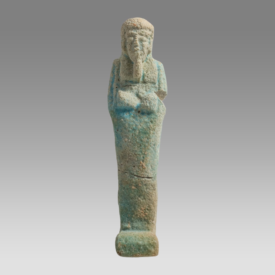 Ancient Egyptian Faience Ushabti Figure Late Period c.300 BC.: Ancient Egyptian Faience Ushabti Figure Late Period c.300 BC. Size 4 inches length. A blue faience Ushabti figure. Provenance: Private Florida collection acquired from a private PA collection.