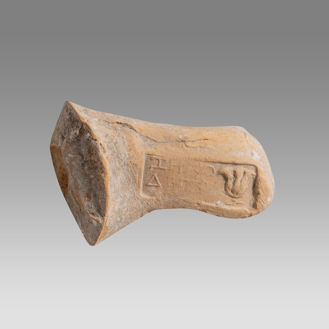 Ancient Judaean Herodian Amphora Handle With Inscription c.1st century BC.: Ancient Judaean Herodian Amphora Handle With Inscription c.1st century BC. Size 3 1/2 inches length, 2 1/2 inches widest point. Ancient Judaean Amphora handle with inscription stamp. Provenance: Ex Pr