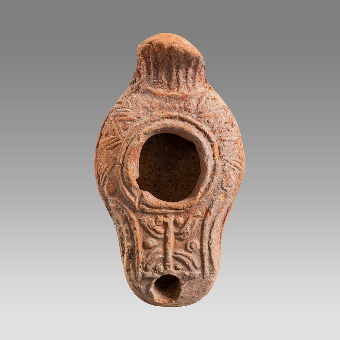 Ancient Holy Land Beit Natif Terracotta Menorah Oil Lamp c.3rd-4th cent CE.: Ancient Holy Land Beit Natif Terracotta Menorah Oil Lamp c.3rd-4th cent CE. Size 4 1/4 inches length, 2 3/8 inches width. with central filling hole, and a single spout along edge. With Menorah and orn
