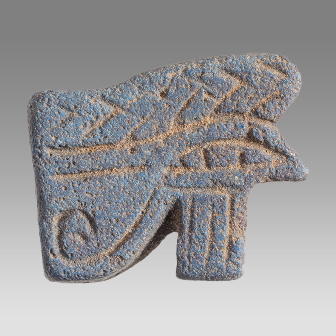 Ancient Egyptian Faience Amulet, Eye Of Horus c.664-332 BC.: Ancient Egyptian Faience Amulet, Eye Of Horus c.664-332 BC. Size 13 x 10 mm. Fine blue faience amulet of eye of Horus. Suspension hole through. Provenance: Private collection, bought via London art ma