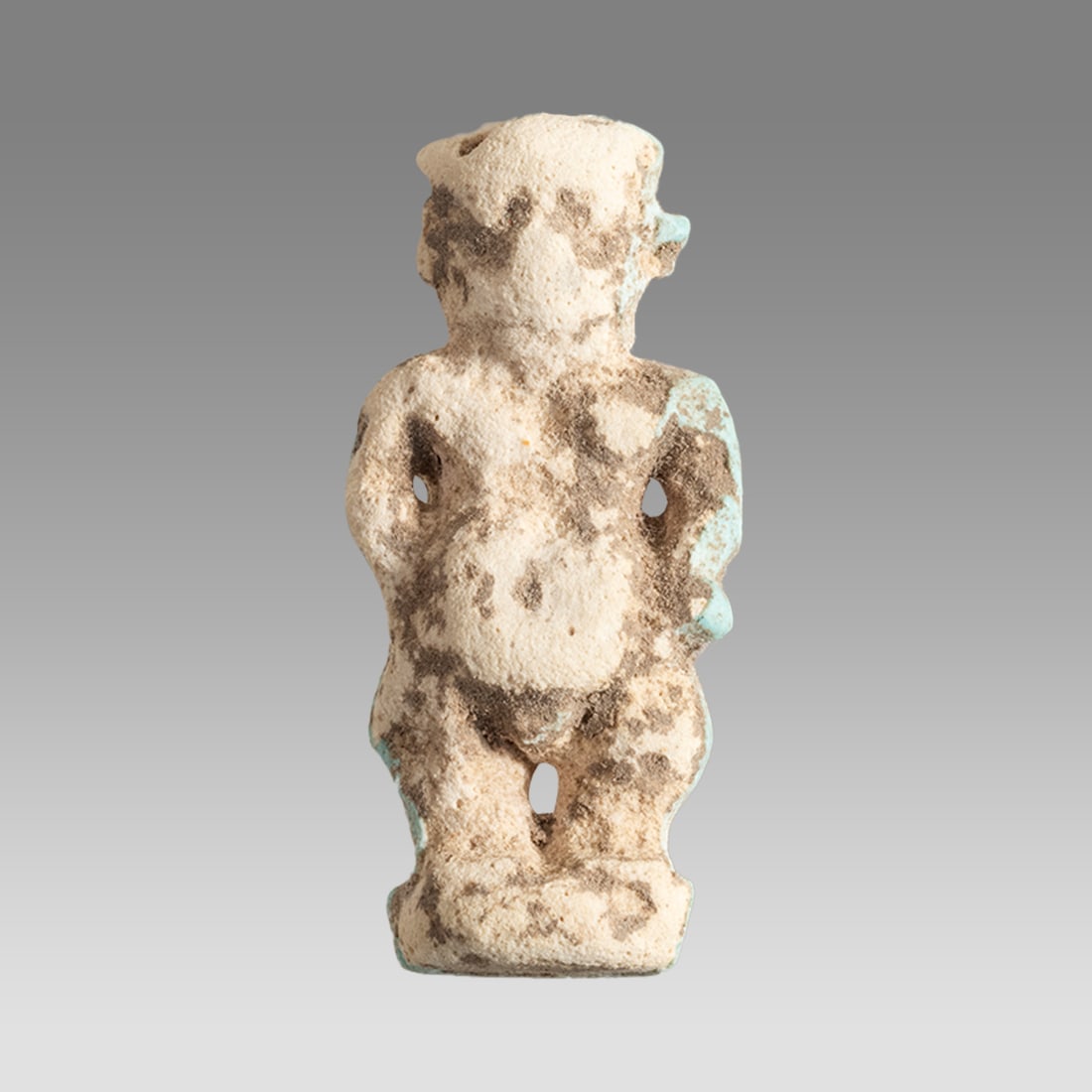 Ancient Egyptian Faience Amulet, Pataikos c.664-332 BC.: Ancient Egyptian Faience Amulet, Pataikos c.664-332 BC. Size 33 x 14 mm. Fine large faience amulet of Pataikos. Provenance: Private collection, bought via London art market, formerly in a 1970s/80s Sw