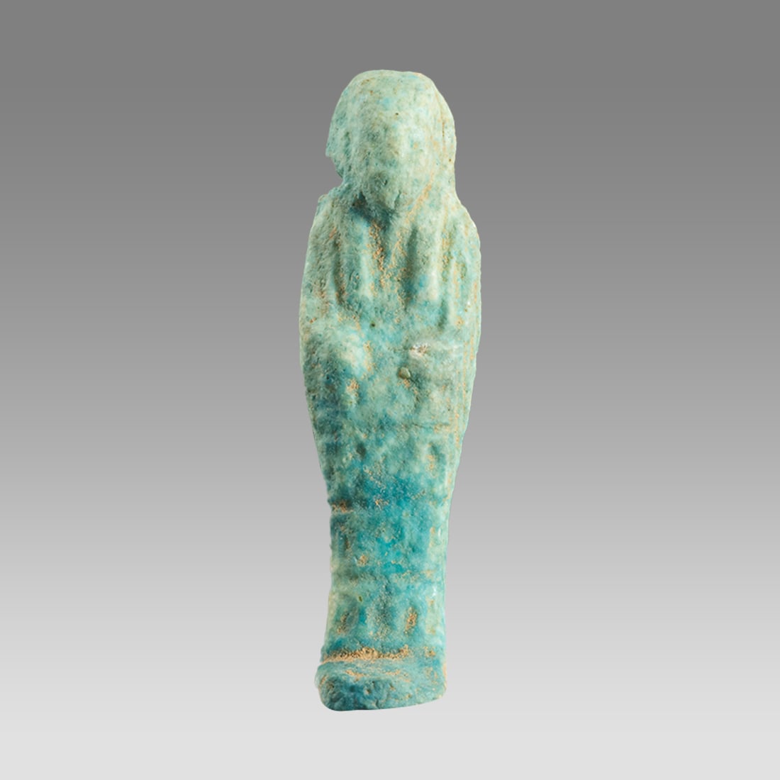 Egyptian Blue Faience Small Ushabti.: Egyptian Blue Faience Small Ushabti. Size 51 mm. Fine blue faience Ushabti amulet with Suspension hole through the neck. Age unknown? Provenance: Private collection, bought via London art market, form