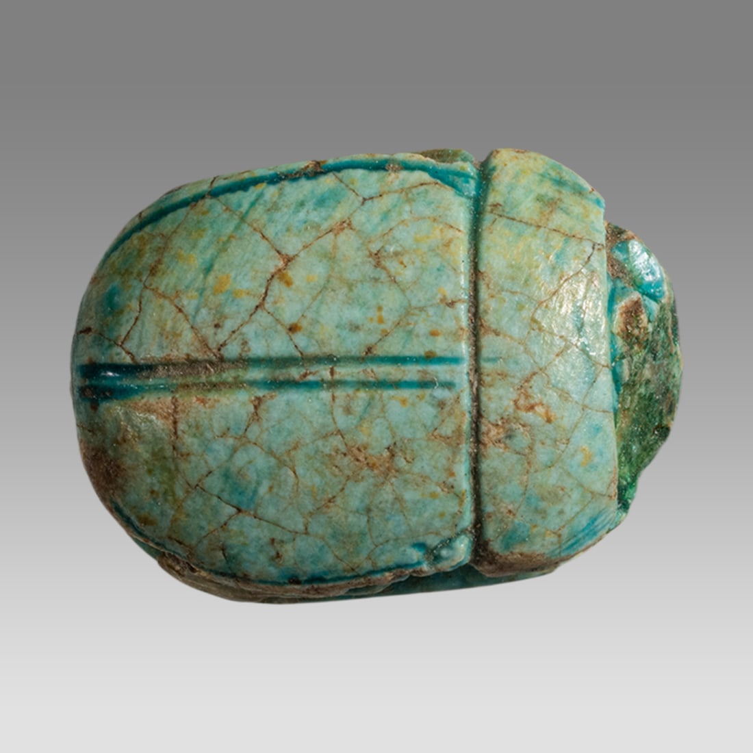 Ancient Egyptian Steatite Scarab New Kingdom c.1550-1070 BC.: Ancient Egyptian Steatite Scarab New Kingdom c.1550-1070 BC. Size 14 x 10 mm. A Steatite Scarab with stylized beetle back and bezel base engraved with Egyptian Heiroglyph. Provenance: Private London c