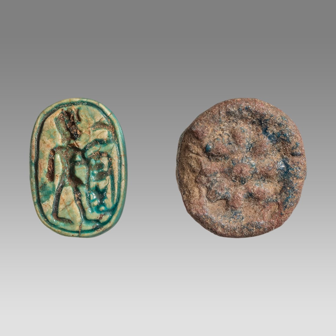 Ancient Egyptian Steatite Scarabs New Kingdom c.1550-1070 BC. (2).: Ancient Egyptian Steatite Scarabs New Kingdom c.1550-1070 BC. (2). Size 13-13 mm. A Steatite Scarab seal engraved on both sides, together with a circular shape button scarab. Both with suspension hole