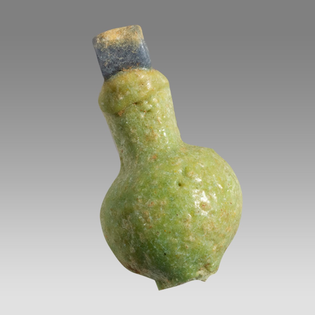 Ancient Egyptian Faience Amulet Late Period c.664-335 BC.: Ancient Egyptian Faience Amulet Late Period c.664-335 BC. Size 11 mm. A yellow and blue faience amulet. Suspension loop at top. Provenance: Private London collection; previously acquired from a Belgia