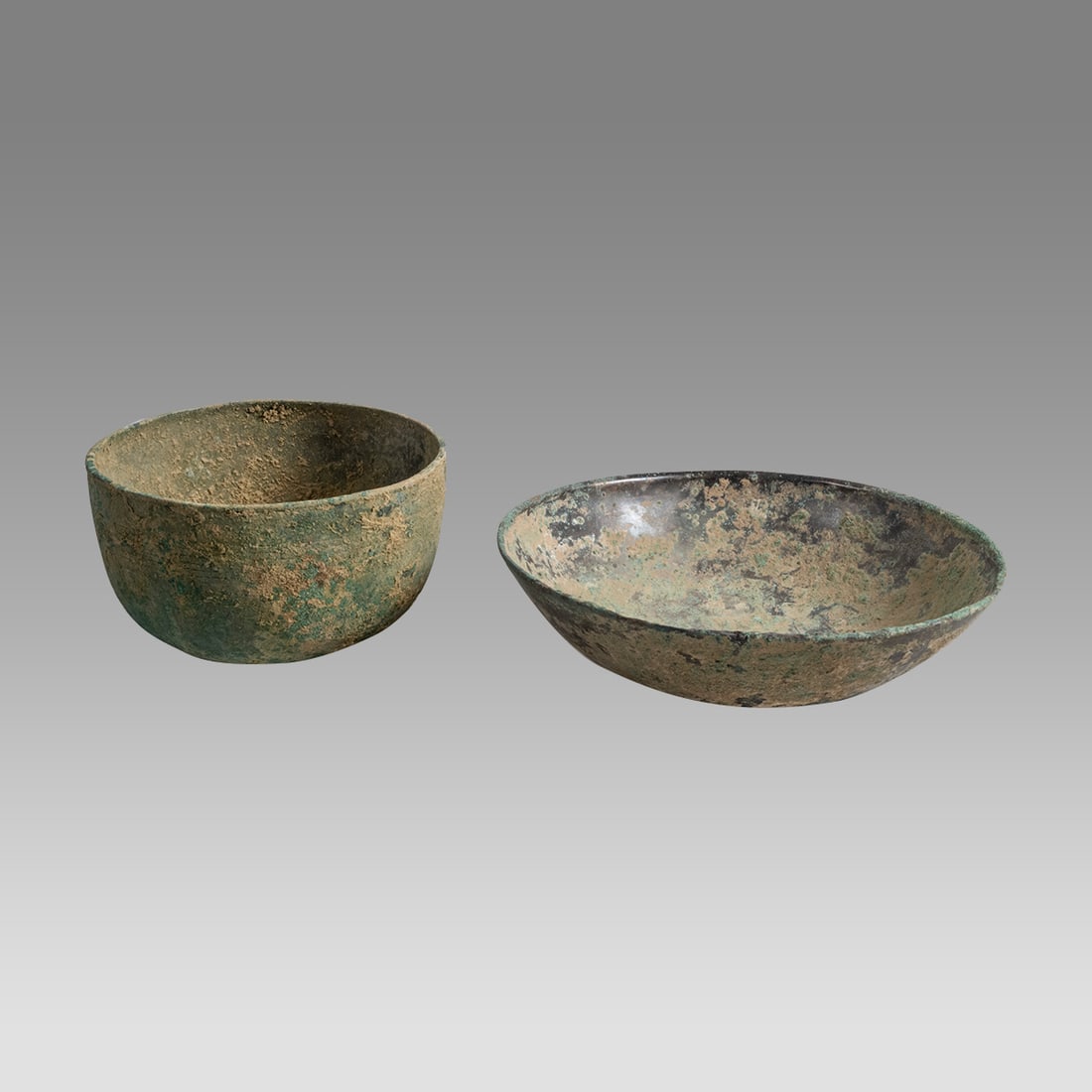 Lot of 2 Ancient Luristan, Sasanian Bronze Bowls c.1000 BC-500 AD.: Lot of 2 Ancient Luristan, Sasanian Bronze Bowls c.1000 BC-500 AD. Size 5 - 6 1/4 inches diameter. 2 - 3 inches hight. A collection of 2 bowls, the Shallow bowl is Sasanian 5th century AD. Provenance: