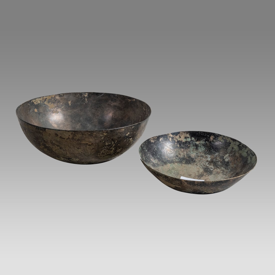 Lot of 2 Ancient Sasanian Bronze Bowls c.500 AD.: Lot of 2 Ancient Sasanian Bronze Bowls c.500 AD. Size 5 3/4 - 7 1/4 inches diameter. 1 3/4 - 3 inches hight. A collection of 2 Sasanian bronze bowls. Nice patina. Provenance: Private collection, bough