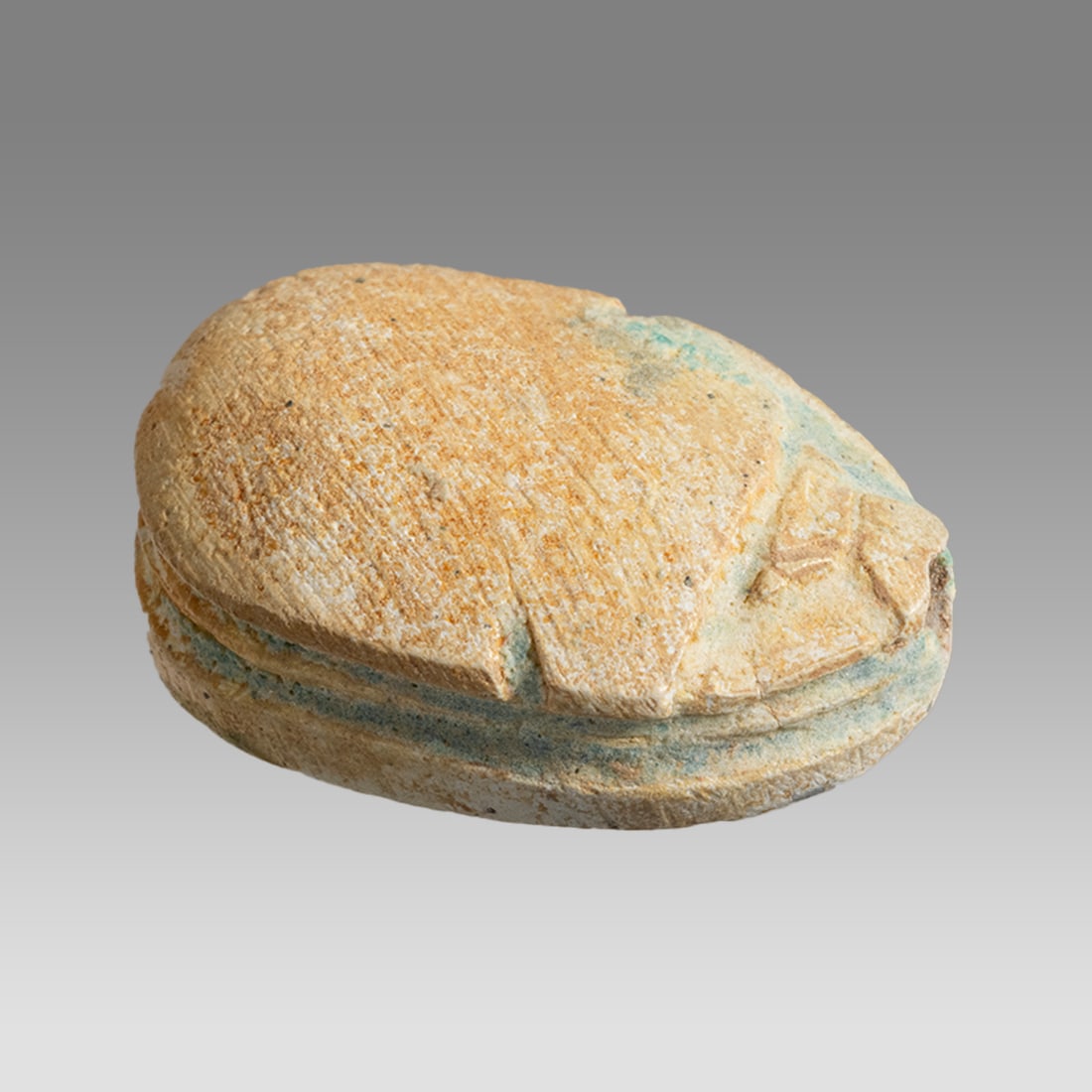 Ancient Egyptian Steatite Scarab New Kingdom c.1550-1070 BC.: Ancient Egyptian Steatite Scarab New Kingdom c.1550-1070 BC. Size 20 x 13 mm. A Steatite Scarab with stylized beetle back and bezel base engraved. Provenance: Ex Secret Eyes Gallery New York 1970's-19