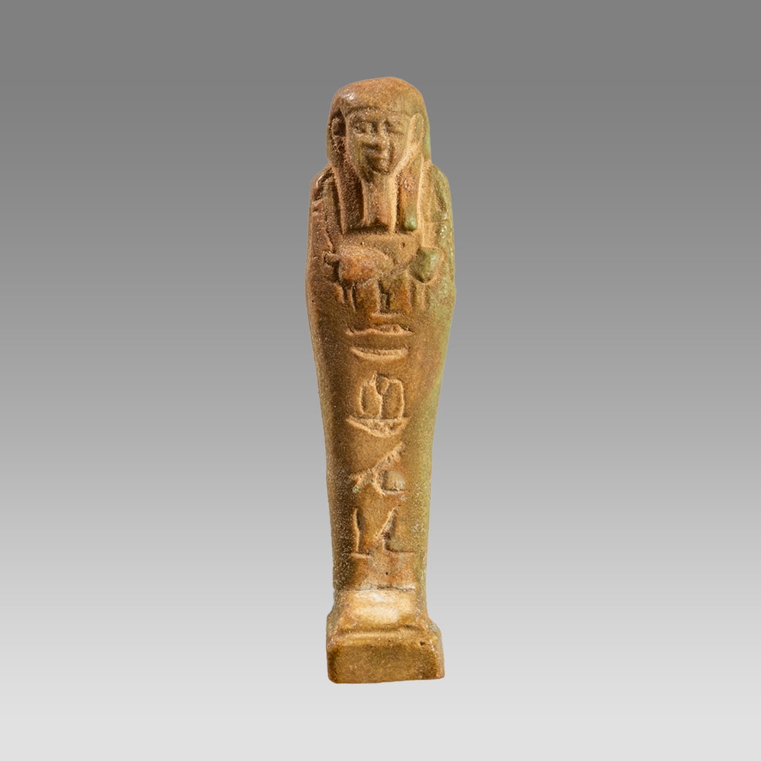 Ancient Egyptian Green Faience Ushabti Late period c.664-332 BC.: Ancient Egyptian Green Faience Ushabti Late period c.664-332 BC. Size 3 5/8 inches high. Late Period, 26th Dynasty, ca. 664 to 332 BCE. Fine green faience ushabti, mummiform figure standing on rectang