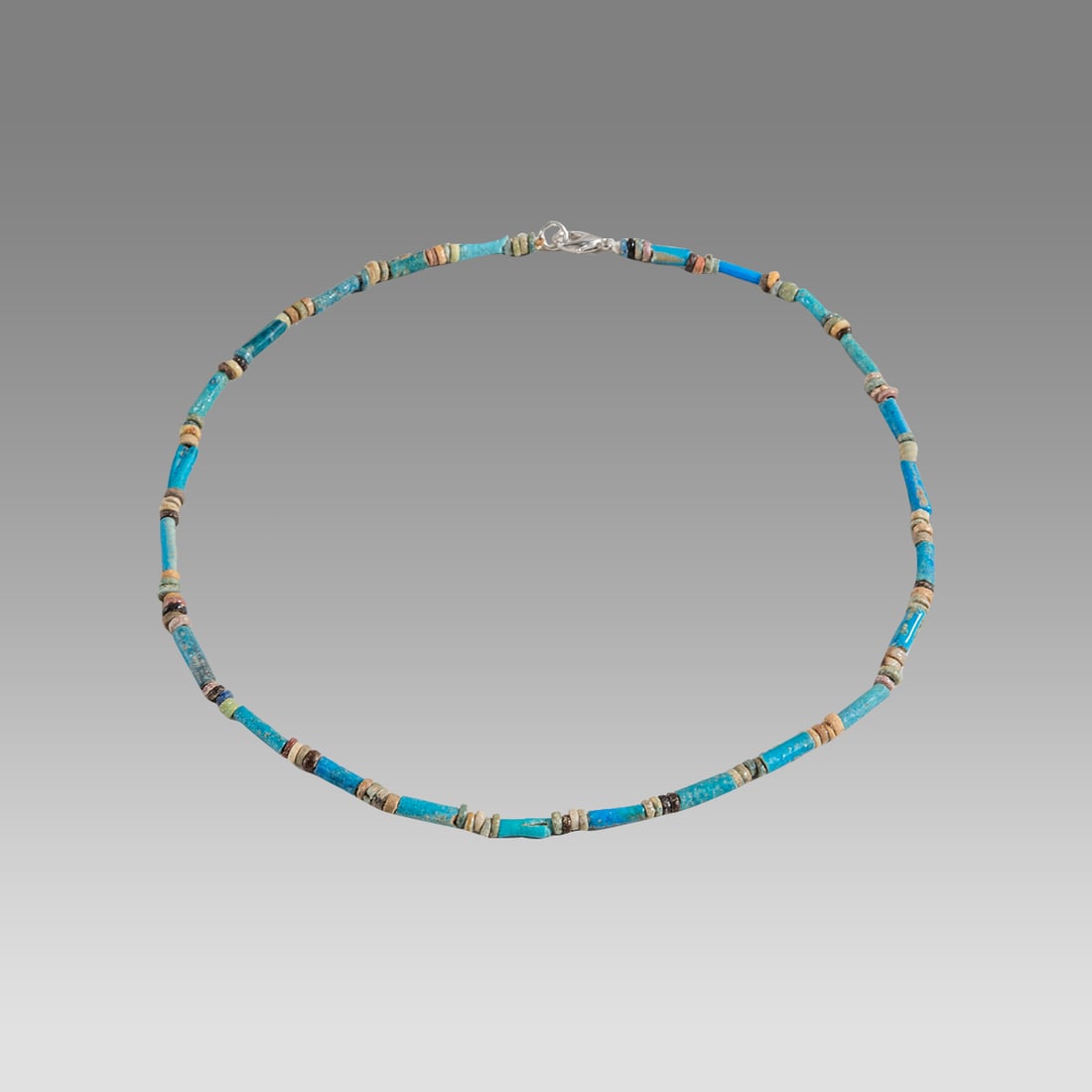 Ancient Egyptian Faience Bead Necklace c.300-50 BC.: Ancient Egyptian Faience Bead Necklace c.300-50 BC. Size 16 3/4 inches length. Great Looking single strand Faience Bead necklace. wearable. Provenance: Ex Secret Eyes Gallery New York 1970's-1980's.