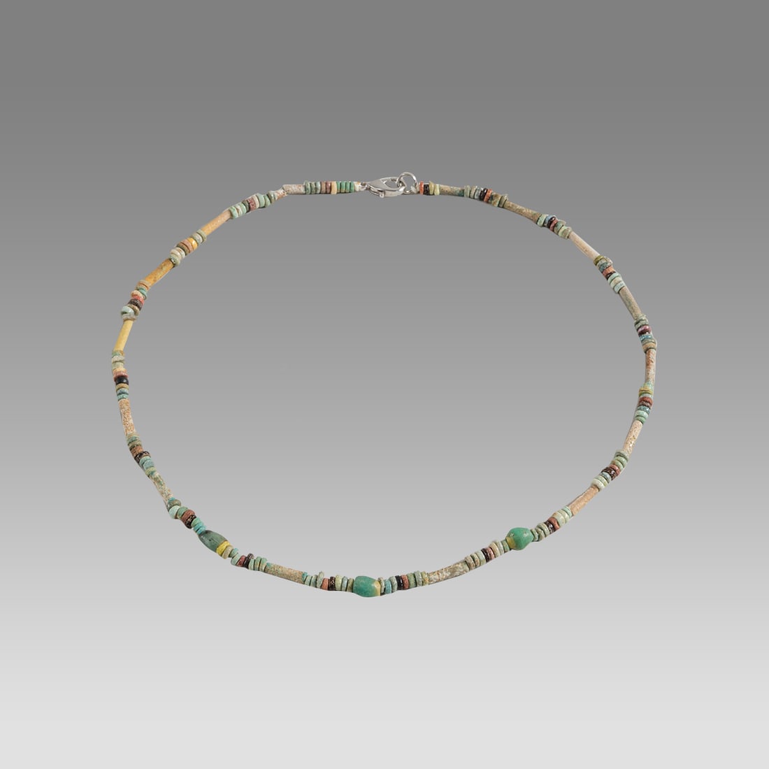 Ancient Egyptian Faience Bead Necklace c.300-50 BC.: Ancient Egyptian Faience Bead Necklace c.300-50 BC. Size 18 inches length. Great Looking single strand Faience Bead necklace with Ancient Roman Glass beads. wearable. Provenance: Ex Secret Eyes Galler