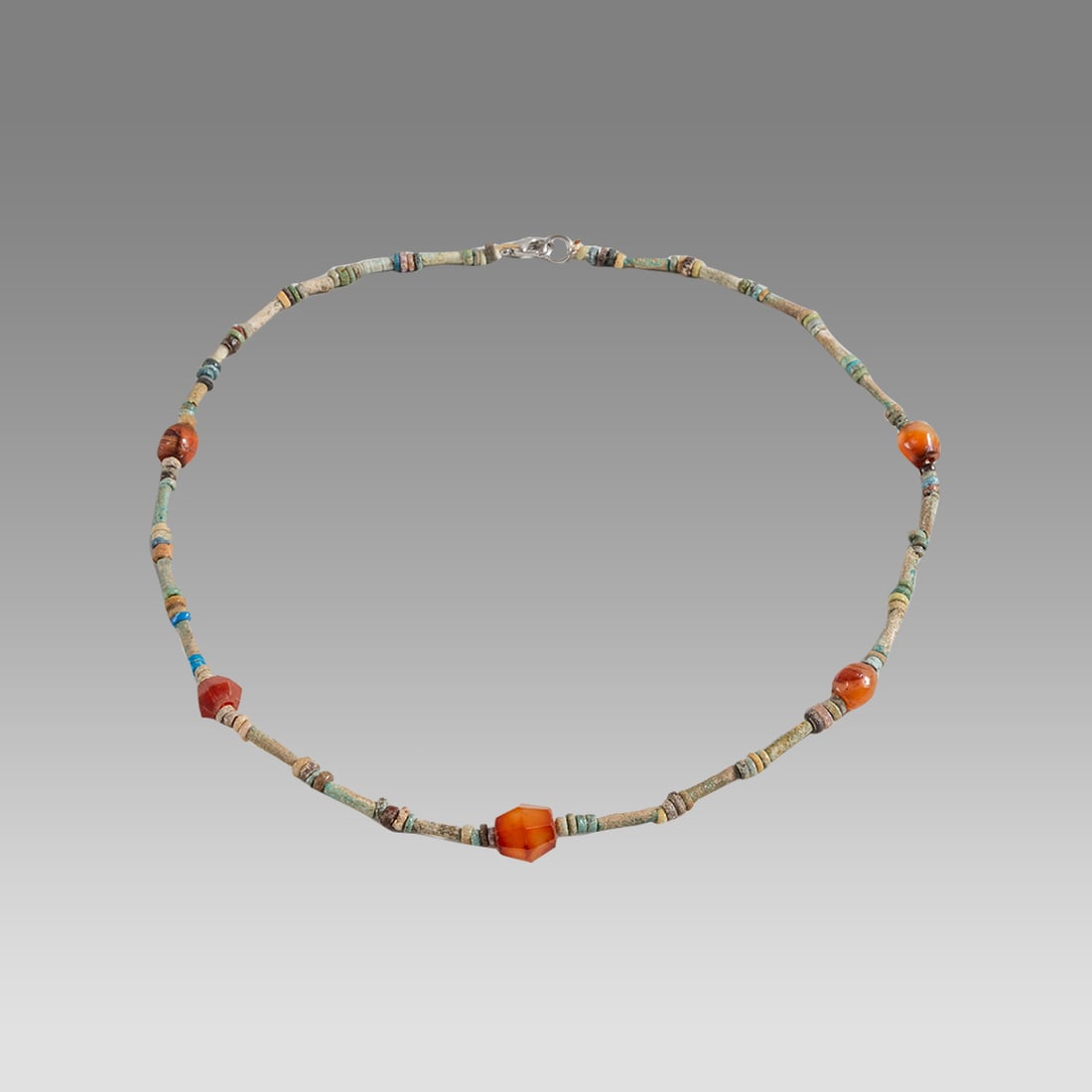 Ancient Egyptian Faience Bead Necklace c.300-50 BC.: Ancient Egyptian Faience Bead Necklace c.300-50 BC. Size 17 3/4 inches length. Great Looking single strand Faience Bead necklace with modern agate beads. wearable. Provenance: Ex Secret Eyes Gallery N