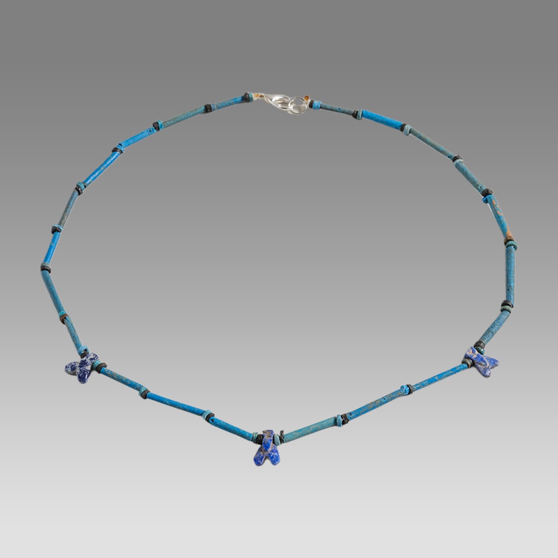 Ancient Egyptian Faience Bead Necklace c.300-50 BC.: Ancient Egyptian Faience Bead Necklace c.300-50 BC. Size 16 1/2 inches length. Great Looking single strand Faience Bead necklace with modern lapis bee amulet. wearable. Provenance: Ex Secret Eyes Gall