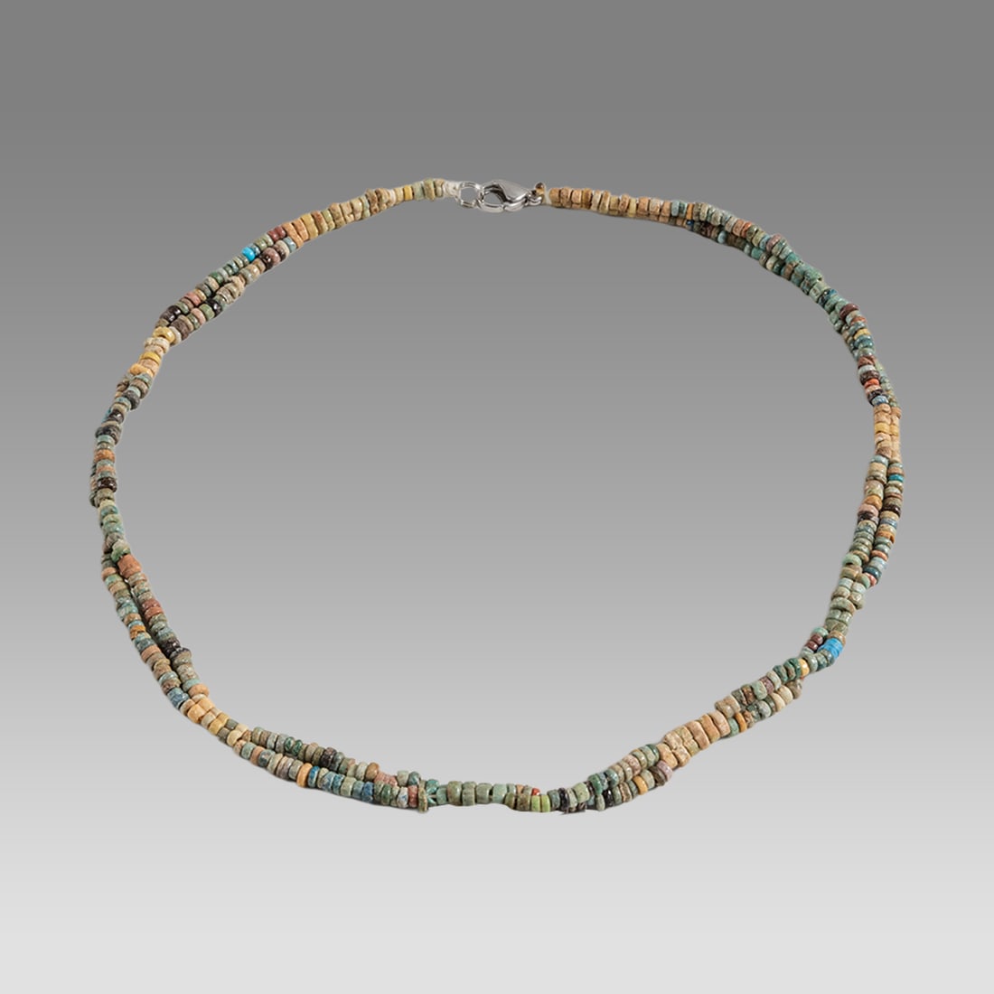 Ancient Egyptian Faience Bead Necklace c.300-50 BC.: Ancient Egyptian Faience Bead Necklace c.300-50 BC. Size 16 1/2 inches length. Great Looking single strand Faience Bead necklace. wearable. Provenance: Ex Secret Eyes Gallery New York 1970's-1980's.