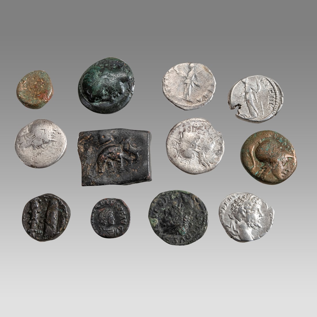 Lot of 12 Ancient Greek and Roman Silver, Bronze Coins c.300 BC-AD. (1 of 2)