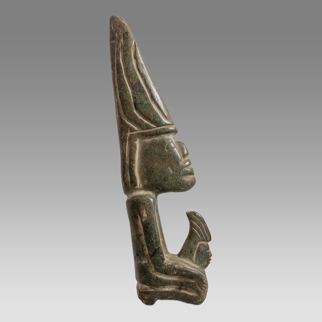 Greenstone Carved Figure.: Greenstone Carved Figure. Size 12 1/4 inches hight, 3 inches width. Age unknown? Provenance: Originally Sold for the benefit of The Everson Museum of Art, Syracuse, NY; gift of Lee Barash of NYC.