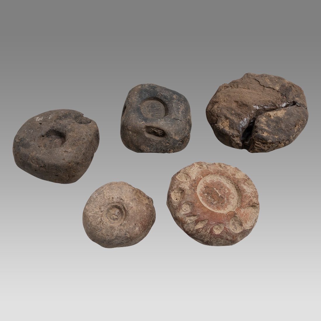 Lot of 5 Sassanian Clay Bullae Ca. 5th century A.D.,: Lot of 5 Sassanian Clay Bullae Ca. 5th century A.D., Size 1 1/2 - 2 1/4 inches diameter. Provenance: Private NYC collection, acquired 1980’s-’90’s from Achmed Saeedi, London.