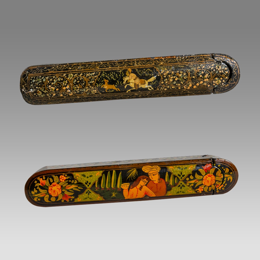 Lot of 2 Antique Persian Qalamdan Pen Boxes, Papier Mache.: Lot of 2 Antique Persian Qalamdan Pen Boxes, Papier Mache. Size 9 - 8 1/4 inches length. larger box with wear to surface.