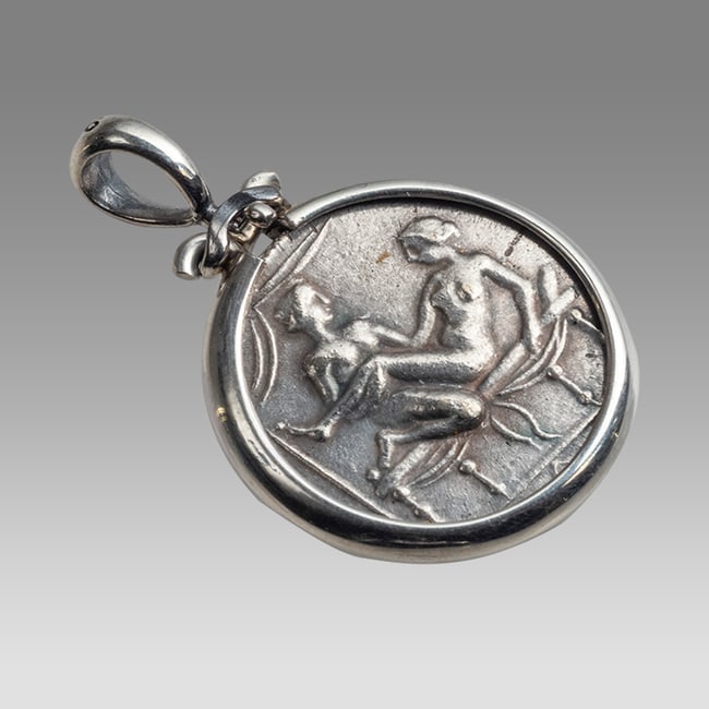 Silver Pendant With Roman Brothel.: Silver Pendant With Roman Brothel. Fine condition. Roman Style Brothel set in Modern Silver pendant with suspension loop. wearable. Size 23 mm diameter.