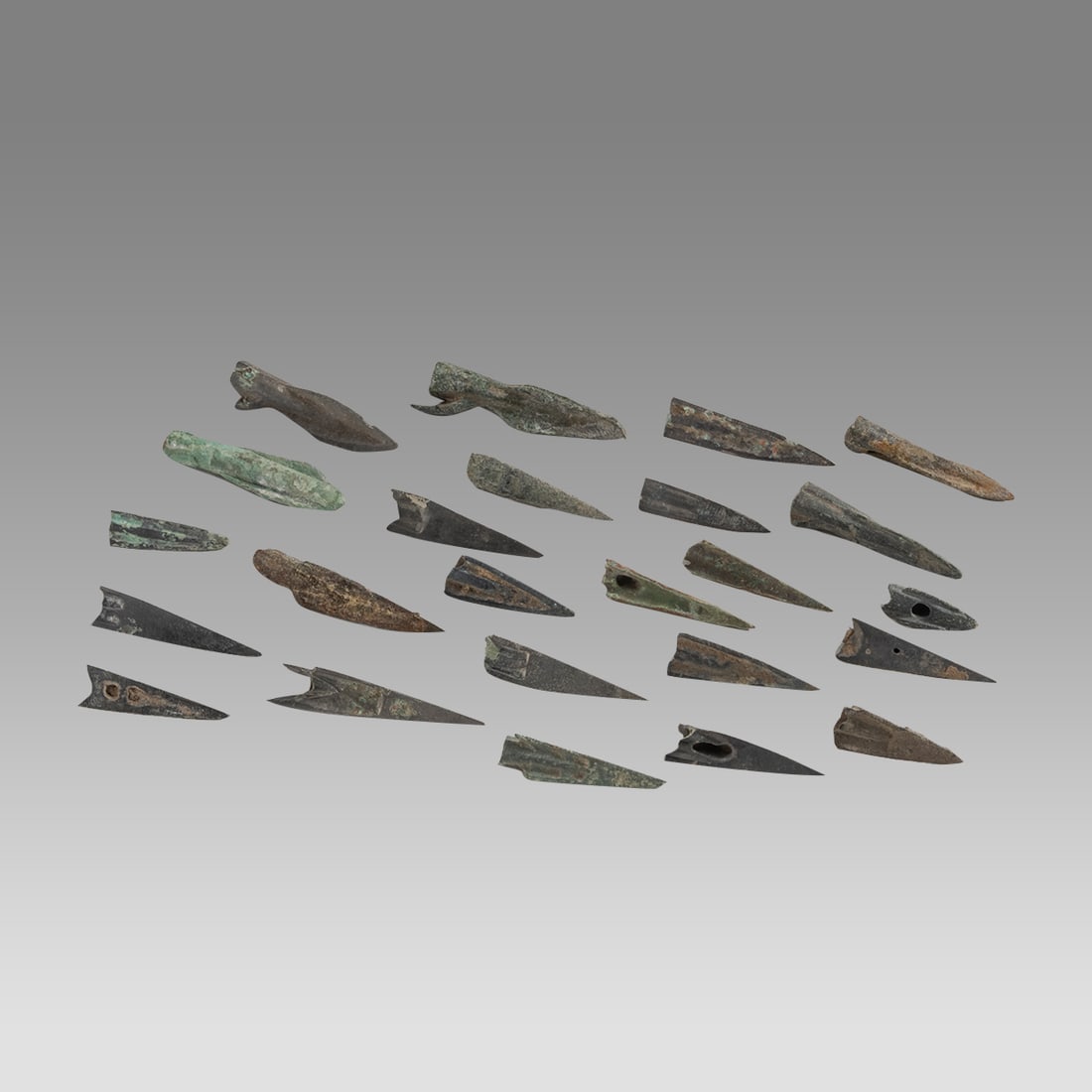 Lot of 24 Ancient Roman, Bronze Arrow Heads c.1st-3rd century AD.: Lot of 24 Ancient Roman, Bronze Arrow Heads c.1st-3rd century AD. Size 16-36 mm. Fine collection of 24 cast bronze arrow heads. Ex Florida collection.