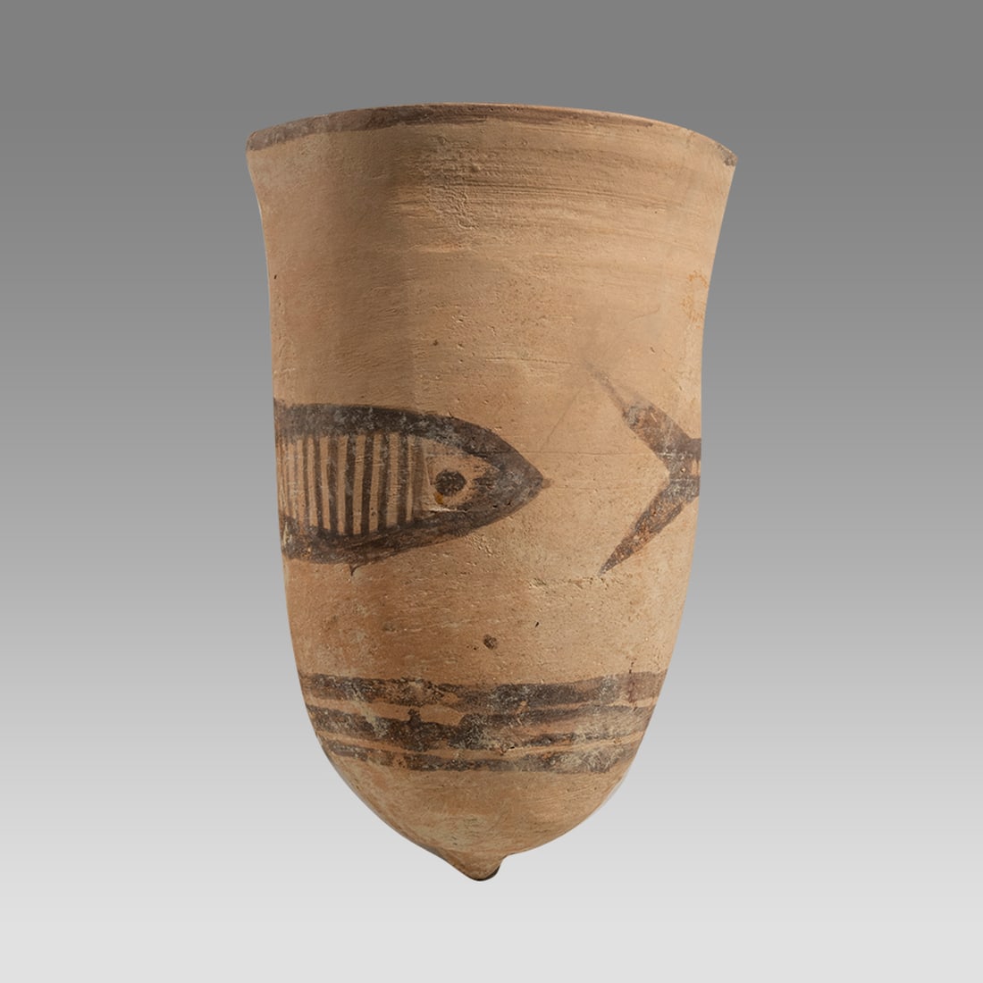 Ancient Indus Valley Pottery Cup with Fish c.2000 BC.: Ancient Indus Valley Pottery Cup with Fish c.2000 BC. Size 5 1/4 inches high. 3 1/2 inches diameter. Unusual decorated indus valley pottery Cone shape cup with fish in the center. Ex NJ collection.