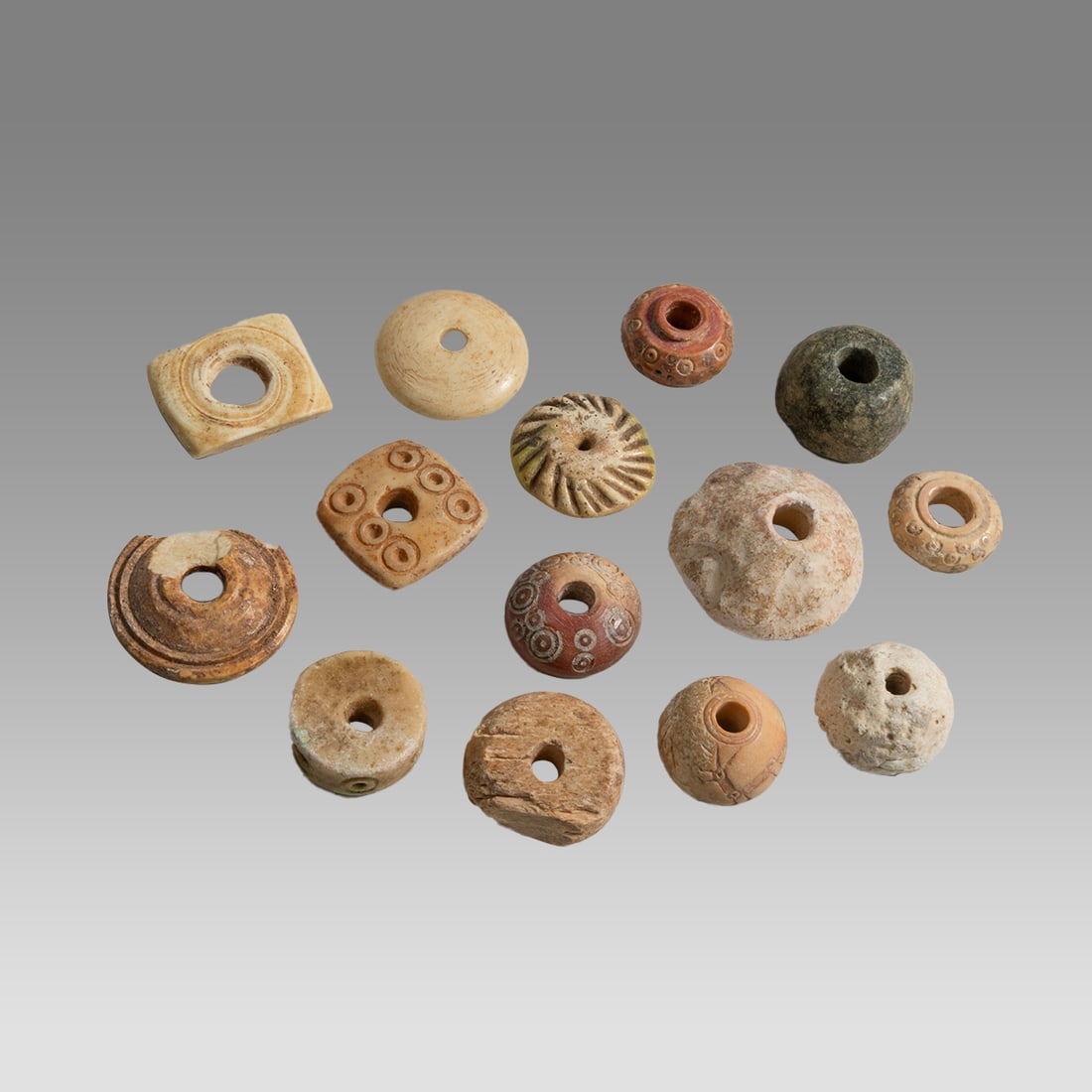 Lot of 14 Ancient Roman Bone Spindle Whorls c.2nd century AD. (1 of 1)