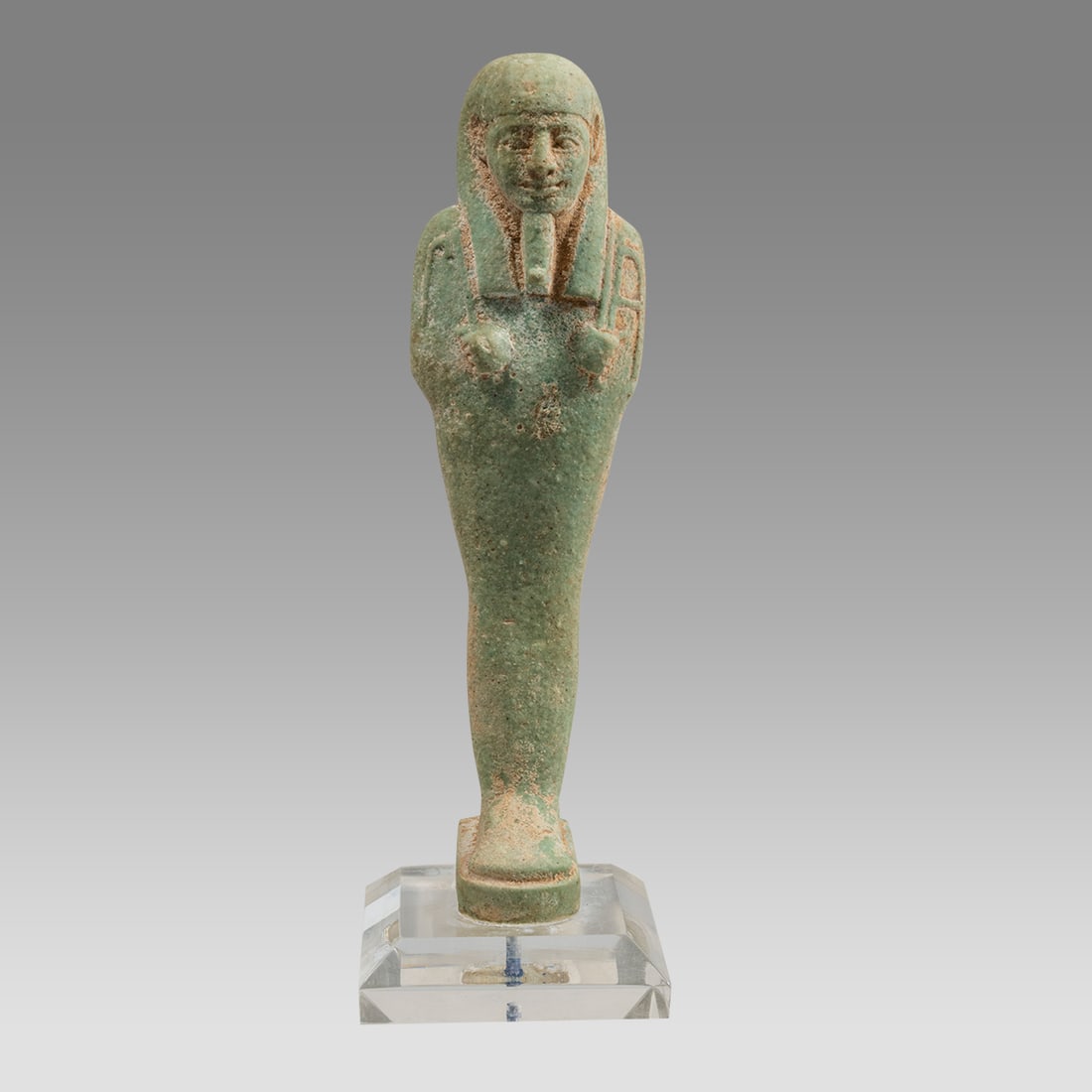 An Egyptian Faience Ushabti Figure. (1 of 3)