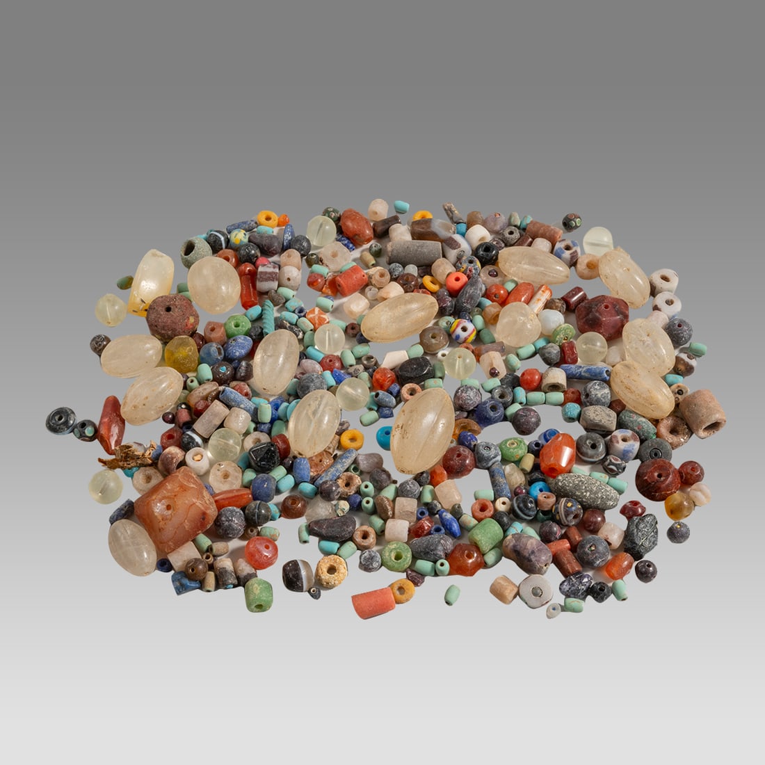 Large Lot of Ancient Roman And Islamic Agate and Glass Loose Beads.: Large Lot of Ancient Roman And Islamic Agate and Glass Loose Beads. Size 6 - 23 mm. Weight 388 grams. Fine Lot of mixed Stone, Agate and Glass Beads. Provenance: Ex NYC Collection acquired in the Lond