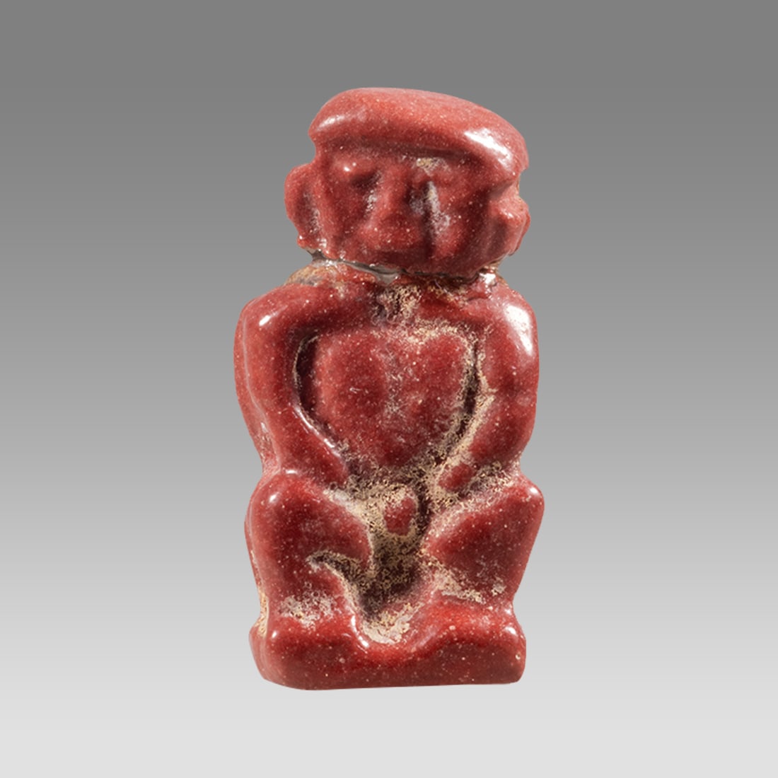Ancient Egyptian Red Faience Pataikos Amulet c.700-30 BCE. (1 of 2)