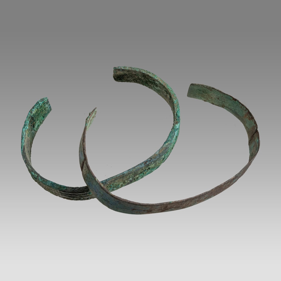 Ancient Kievan, Rus Viking Cuff Lake Ladoea Region Bronze Bracelets c.800-1200 AD.: Ancient Kievan, Rus Viking Cuff Lake Ladoea Region Bronze Bracelets c.800-1200 AD. Size 2 1/2 - 2 5/8 inches width. A collection of 2 bronze bracelets. Provenance: From a private Altmar, New York Coll