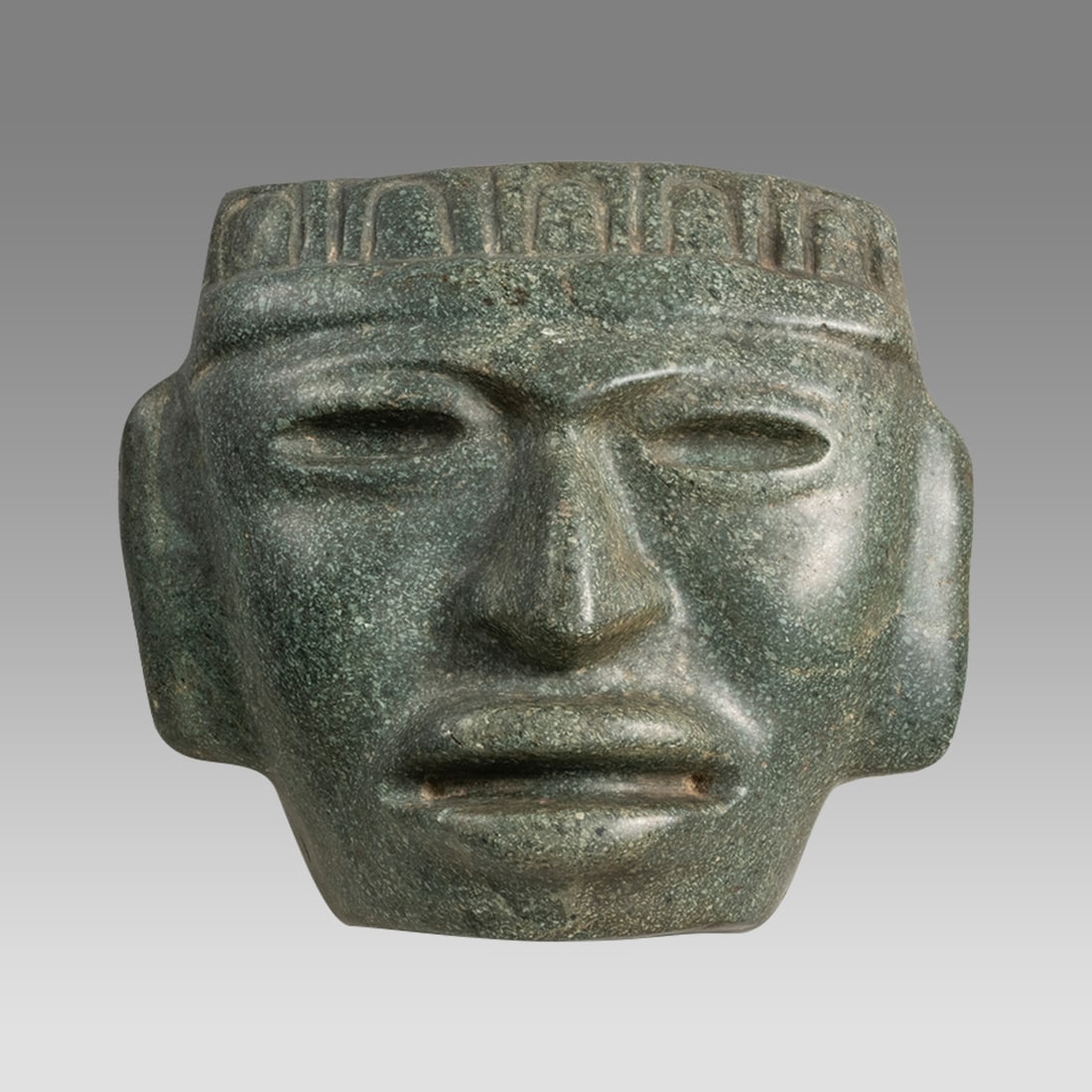 A Pre Columbian Style Carved Stone Large Mask. (1 of 1)