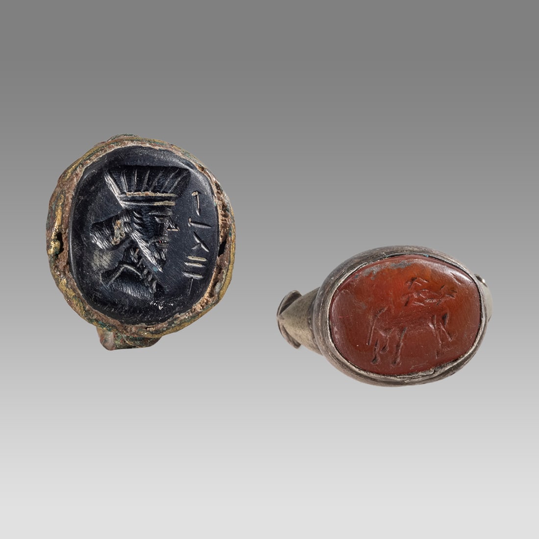 Lot of 2 Sasanian Style Silver, bronze Rings with Agate Intaglio. (1 of 2)