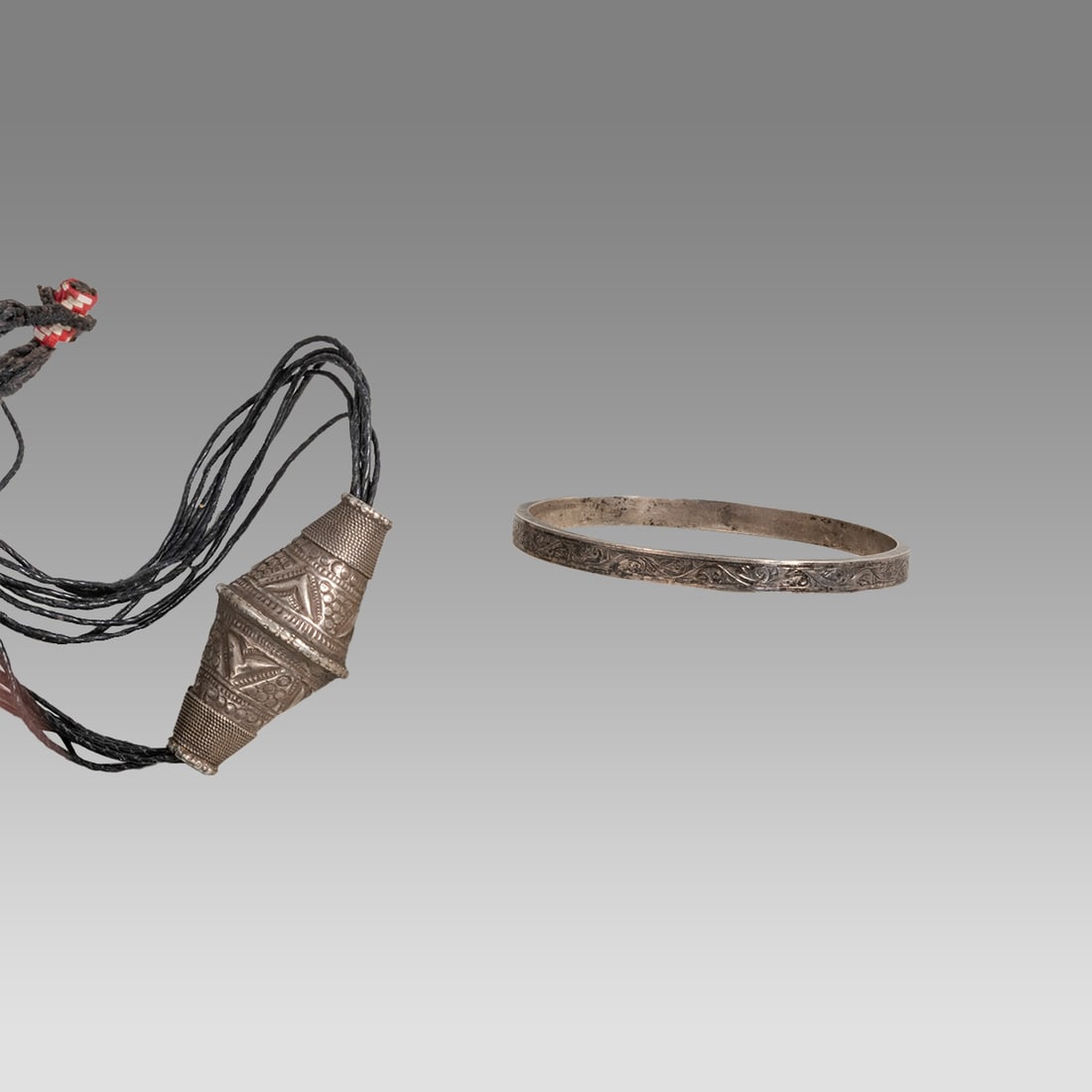 Lot of 2 Indian, Middle Eastern Large Silver bead and Bracelet.: Lot of 2 Indian, Middle Eastern Large Silver bead and Bracelet. Size 2 1/2 - 3 inches. A collection of silver bead together with a silver bracelet. wearable.