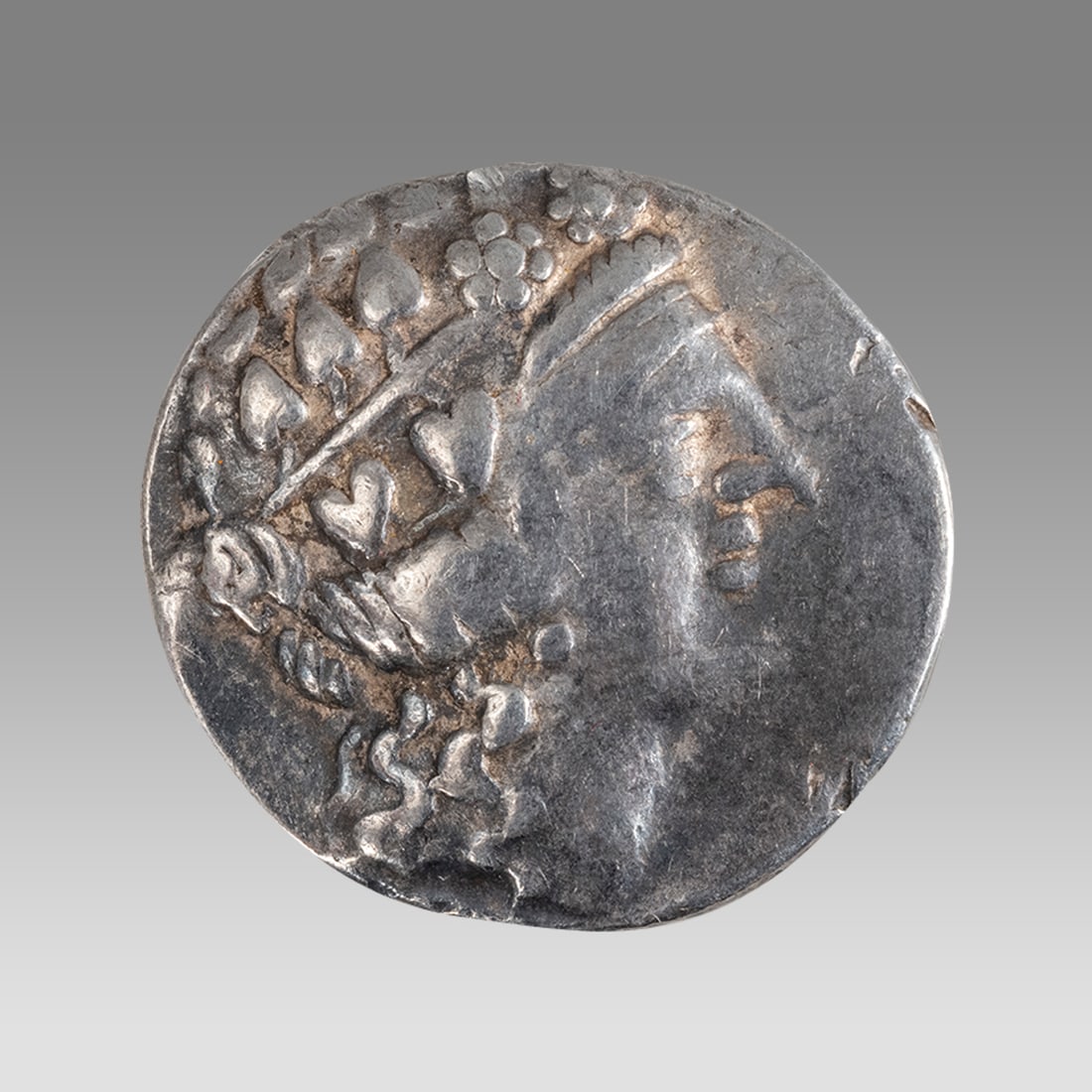Ancient Greek Thrace Thasos Silver Tetradrachm, Circa 2nd-1st Century BC: A large silver ancient Greek Thrace, Thasos tetradrachm, circa 2nd-1st century BC, the obverse showing the head of Dionysus facing right, wreathed in ivy leaves, and the reverse depicting Hercules sta